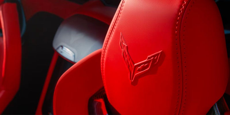Red Corvette seat with embroidered logo