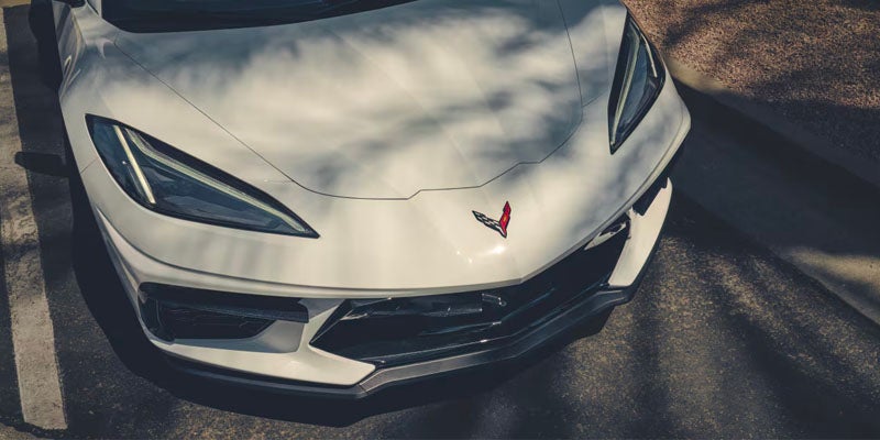 Front view of white Corvette in sunlight